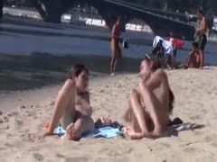 Long haired all exposed brunettes had joy on the nudist beach jointly 